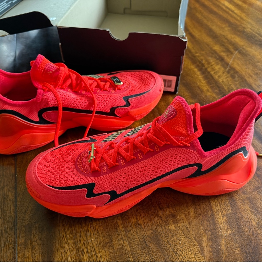 Vibrant Orange Adidas Sneakers